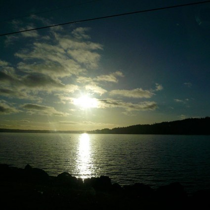 Watching the sun set over the water